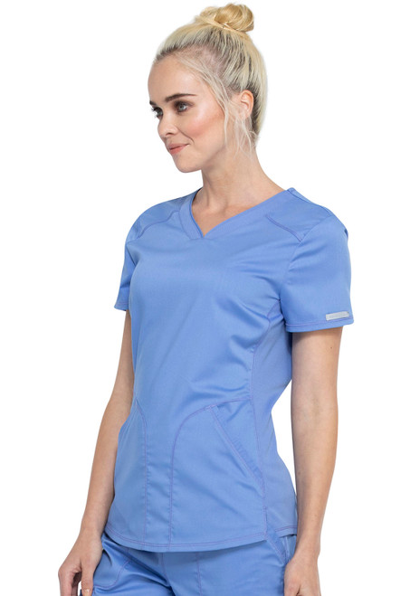 WW Revolution V-Neck Top WW601: Stylish and functional nurse scrubs with a modern classic fit. Features include a soft V-neck, breathable mesh neckband, handy pockets, and instrument loops. Center back length: 26 inches. 