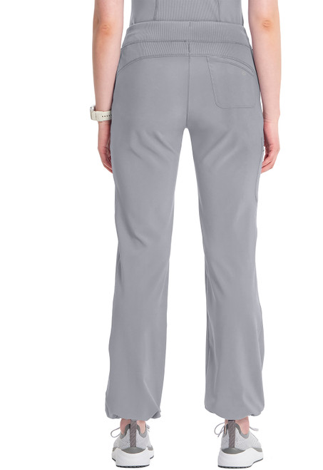 Infinity Petite Straight Leg Drawstring Pant: 95% polyester, 5% spandex. Ideal for healthcare professionals. Features comfortable fit, practical pockets, and 28.5" petite inseam. Perfect for versatile style and function in medical uniforms.