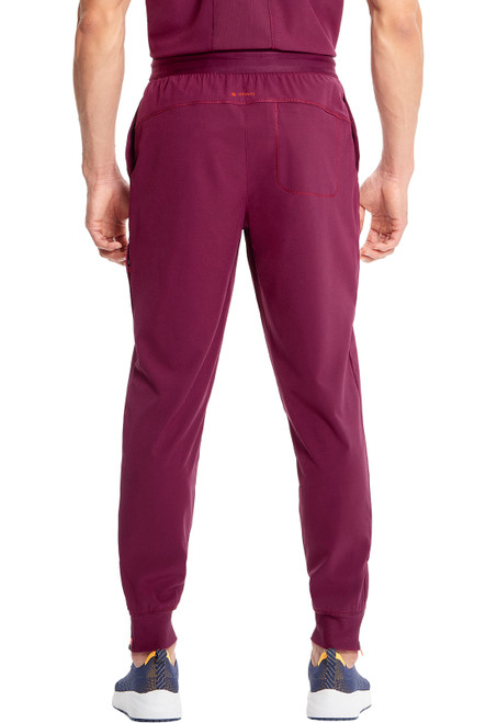 Infinity GNR8 Men's Mid Rise Jogger: breathable, stylish scrubs for healthcare professionals. Features adjustable waistband, multiple pockets, and tapered fit for comfort during long shifts.