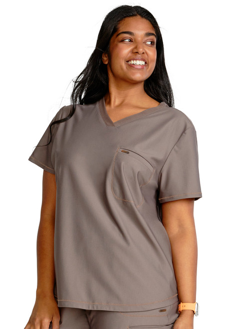 Cherokee Form Tuckable V-Neck Top: Stylish, durable scrubs in 86% Nylon / 14% Spandex Knit. Features multiple pockets, moisture-wicking, and wrinkle resistance for all-day comfort.