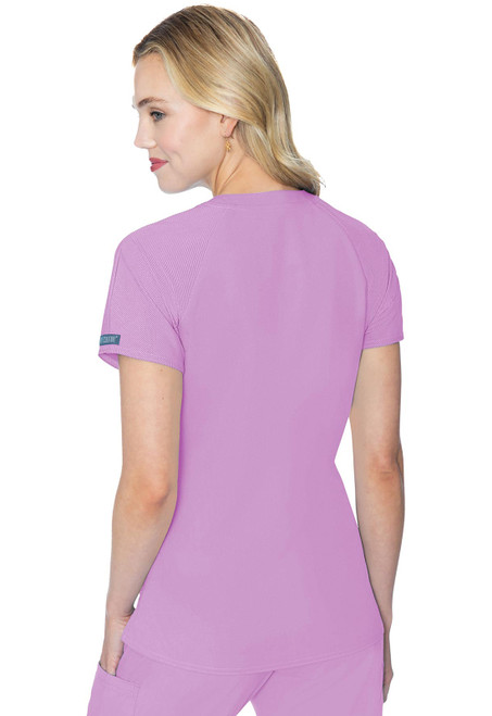 Back view of the MC Touch Raglan Sleeve Top MC7425 highlights its versatile design for medical uniforms. Made from 76% polyester, 21% rayon, 3% spandex, it ensures comfort, flexibility, and features patch pockets, ideal for healthcare professionals.