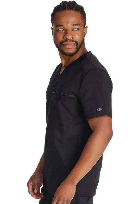 Left view of Dickies Balance Men's Tuckable V-Neck Top DK865: durable scrubs with rib knit inserts, shoulder yokes, bungee loop for ID badges, and double chest pocket. Ideal for nurses and medical uniforms.