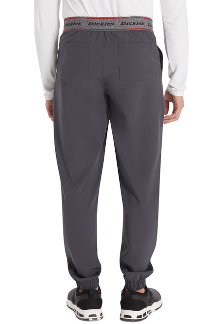 EDS NXT Men's Mid Rise Jogger: Stylish back view with mock fly, drawstring, and six pockets. Breathable fabric ensures comfort for demanding shifts. Perfect blend of functionality and style for essential medical uniforms.
