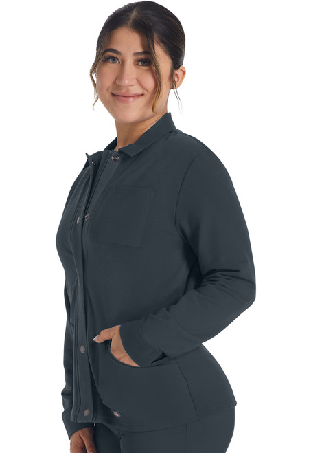 Left view of the EDS NXT Zip Front Fleece Jacket DK319. Ideal for medical uniforms, it has a concealed zip, three pockets, and a woven collar. Made from quality fleece with a 24" back length, it combines comfort with a professional look.