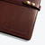 An up-close image of the "Better Than I Deserve" Genuine Leather Padfolio's bottom right corner where "Better than I deserve." is debossed next to the Ramsey Solutions submark logo An up-close image of the "Better Than I Deserve" Genuine Leather Padfolio's bottom right corner where "Better than I deserve." is debossed next to the Ramsey Solutions submark logo