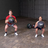 Squats with the Body-Solid Tools Heavy Rubber Balls