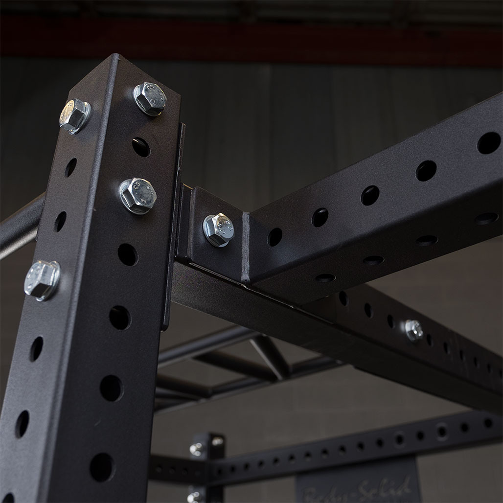 Detail of the connection of the Pro ClubLine SPRACB Rack Connecting Bar to the Power Rack frame