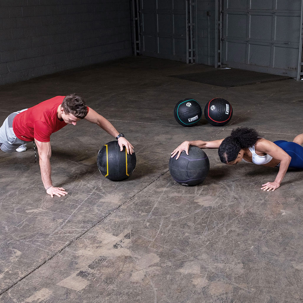 One Arm Push-Up with the Body-Solid Tools Heavy Rubber Balls