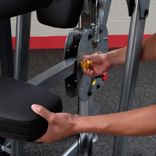 Details of the Kneepad Adjustment on the Body-Solid Pro-Select FCD-STK Weight Assist Chin-Up Dip Machine