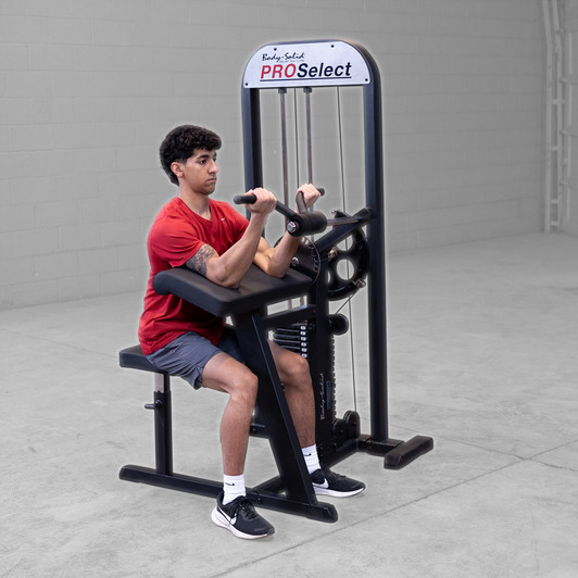 Tricep Press Downs on the Body-Solid Pro Select GCBT-STK Bicep Tricep Machine 210 lb. Stack
