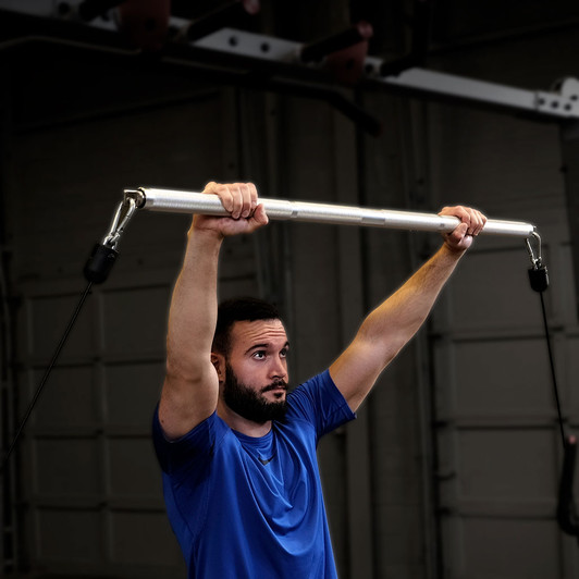 Overhead Press with the Body-Solid Tools Aluminum Double Swivel Bar