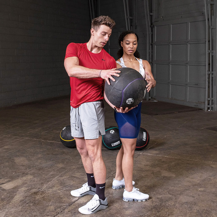 Oblique Twist Pass with the Body-Solid Tools Heavy Rubber Balls