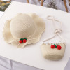 Cherry straw hat & bag set for kids on table