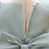 Discover the enchantment of our mint green dress for girls - a dreamy creation adorned with glossy satin, puffy sleeves, and delicate pearl trim. Featuring a charming bow in front and back, this dress is beautifully lined with soft cotton fabric for ultimate comfort