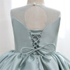 Discover elegance and charm with our enchanting mint green dress for girls. Crafted from glossy satin fabric, adorned with a delightful bow featuring pearl trim on the edges. The dress comes with a convenient rope to tie at the back, ensuring a perfect fit. Lined with soft cotton fabric for absolute comfort. Shop now and make her special moments even more magical!