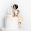 cream floral dress on kid model