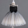 Discover our enchanting girls' dress: a dazzling blend of elegance and style. Featuring a black sequins bodice with a charming black bow, adorned with a shimmering star foil print. The ombre shade black and cream tulle skirt adds a touch of magic, while the comfortable cotton lining ensures a perfect fit. Make her shine on any special occasion!