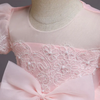 Discover elegance and charm with our pink-colored mesh fabric dress for girls. Featuring exquisite French lace on the bodice and skirt, puffy lace sleeves, and adorable bows on both front and back. Comfortable cotton lining completes the look for a perfect blend of style and comfort.