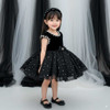 girl wearing noir star dress