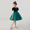 Discover the enchanting world of green dresses for girls at our online store! Immerse in elegance with our stunning sequin bodice and sparkly tulle skirt design, perfect for any special occasion. Crafted with love, each dress is lined with soft cotton fabric to ensure comfort and confidence all day long. Embrace the whimsical charm of puffy sleeves and a delightful bow to tie the waist. Available in a variety of shades, including the mesmerizing green option. Make your little one shine in our green dress collection today