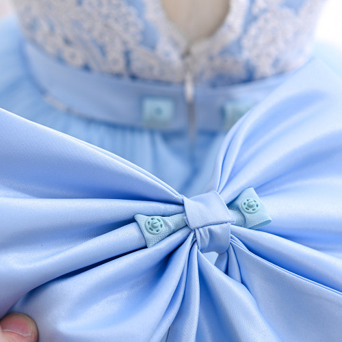 blue  baby lace dress on mannequin back close up blue  baby lace dress on mannequin back close up