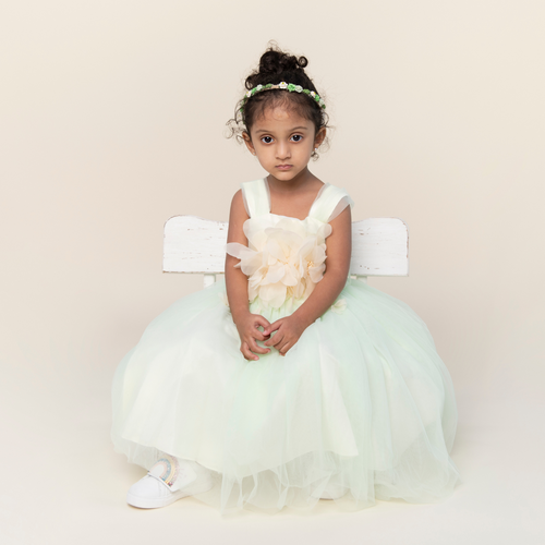 baby model wearing green dress baby model wearing green dress