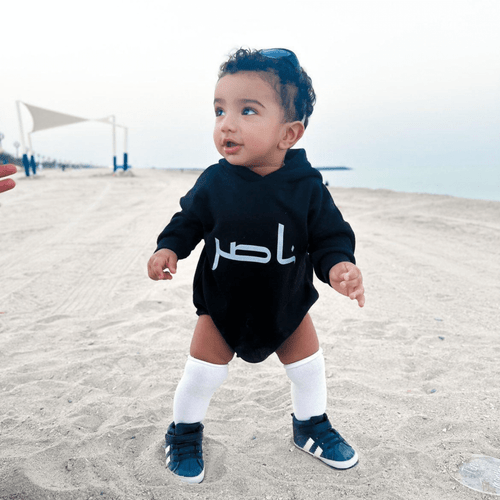 black hoodie onesie on baby front black hoodie onesie on baby front