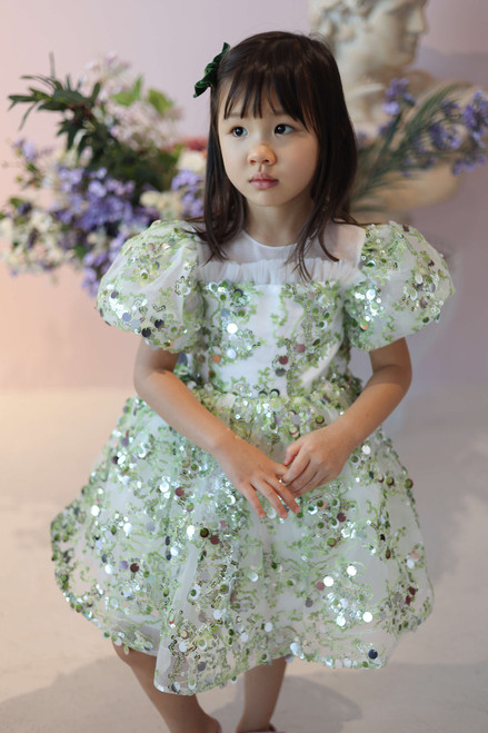 girl wearing green dress