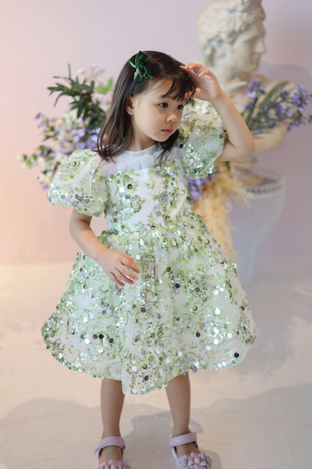 girl wearing green dress