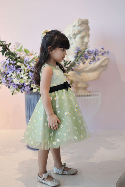 model wearing green dress