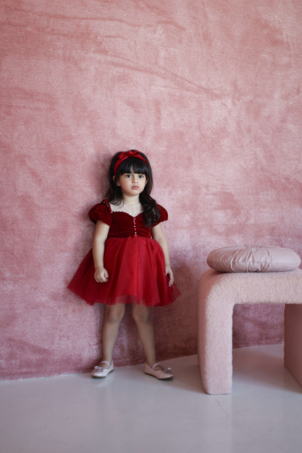 model wearing red dress