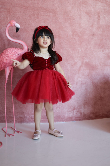 model wearing red dress