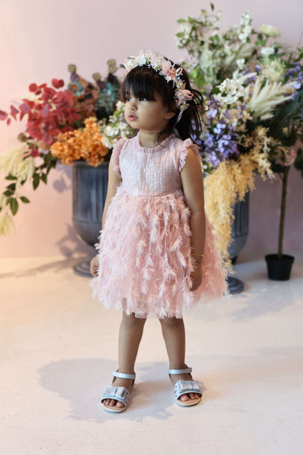 model wearing pink dress