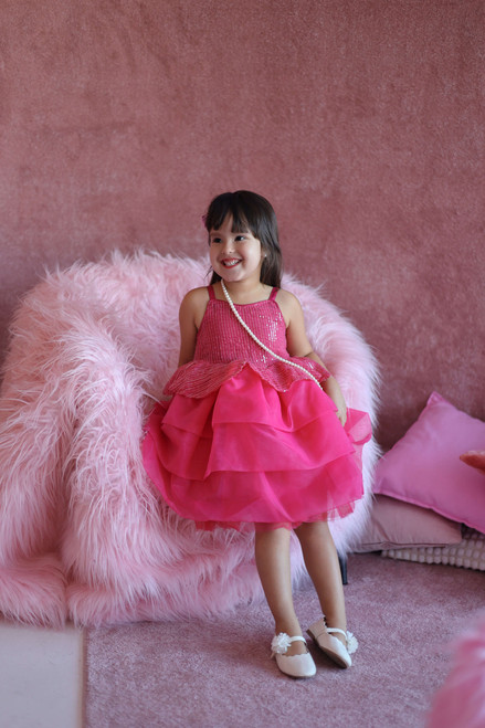 model wearing hot pink dress