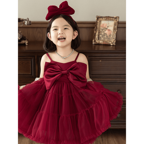 girl model wearing maroon dress