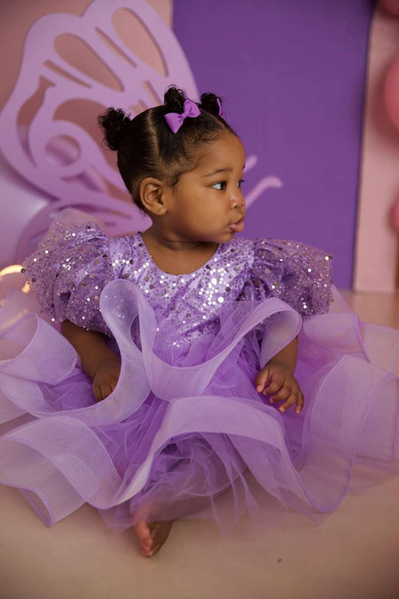 model wearing purple dress model wearing purple dress