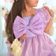 Discover the enchanting world of girls' purple dresses with sequins, featuring a delightful big bow, two-tiered puffy skirt, and charming puffy sleeves. Perfect for special occasions and creating magical memories. Shop now for the latest styles!