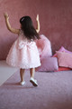 Girl wearing pink dress