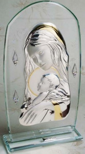  A glass plaque depicting a Mother tenderly holding a baby, symbolizing love and nurturing.