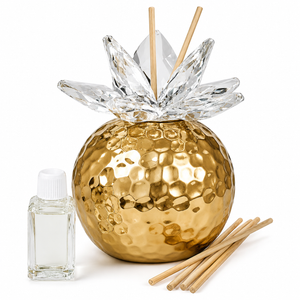 Gold crystal lotus reed diffuser wedding favor with elegant hammered gold base

