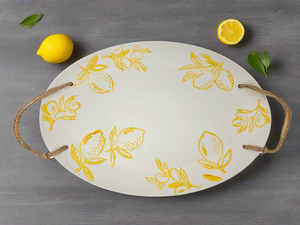 A white oval, 16 inch platter with lemon design and rope handles perfect for wedding favors