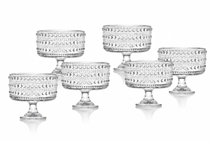 Set of six clear hobnail glass dessert bowls on pedestal bases arranged on a white background, elegant dessert cups for weddings, bridal showers, candy buffets, and special events