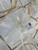 featuring white tulle and gold trim, ideal for party favors and decorations at Italian weddings.