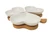 Four heart-shaped bowls elegantly arranged on a bamboo stand, perfect for serving appetizers at weddings or bridal showers.
