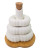 A decorative stack of white ceramic salt and pepper shakers with an oil bottle on a bamboo base, suitable for wedding favors.