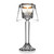 A crystal votive holder lamp with a lit candle, perfect for wedding favors and adding elegance to any setting.