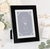 A 5x7 black alternative metal photo frame with a white mat and silver trim for wedding, engagement, bridal shower, and anniversary photos.