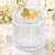 Clear crystal prism candy box with gold butterfly lid for wedding favors and bridal showers.