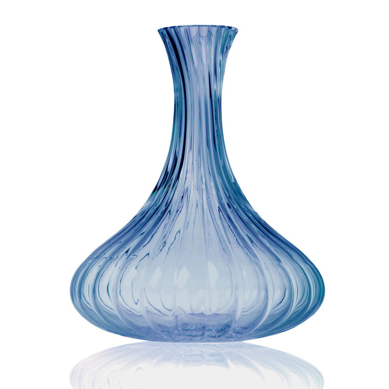 A beautifully curved blue vase, serving as a charming wedding favor, enhancing the decor with its elegant design.