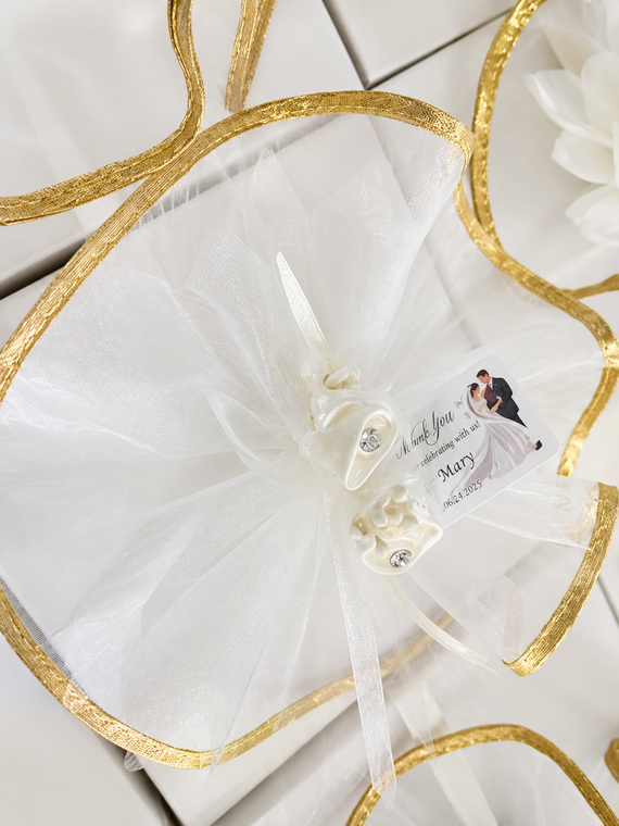 featuring white tulle and gold trim, ideal for party favors and decorations at Italian weddings.